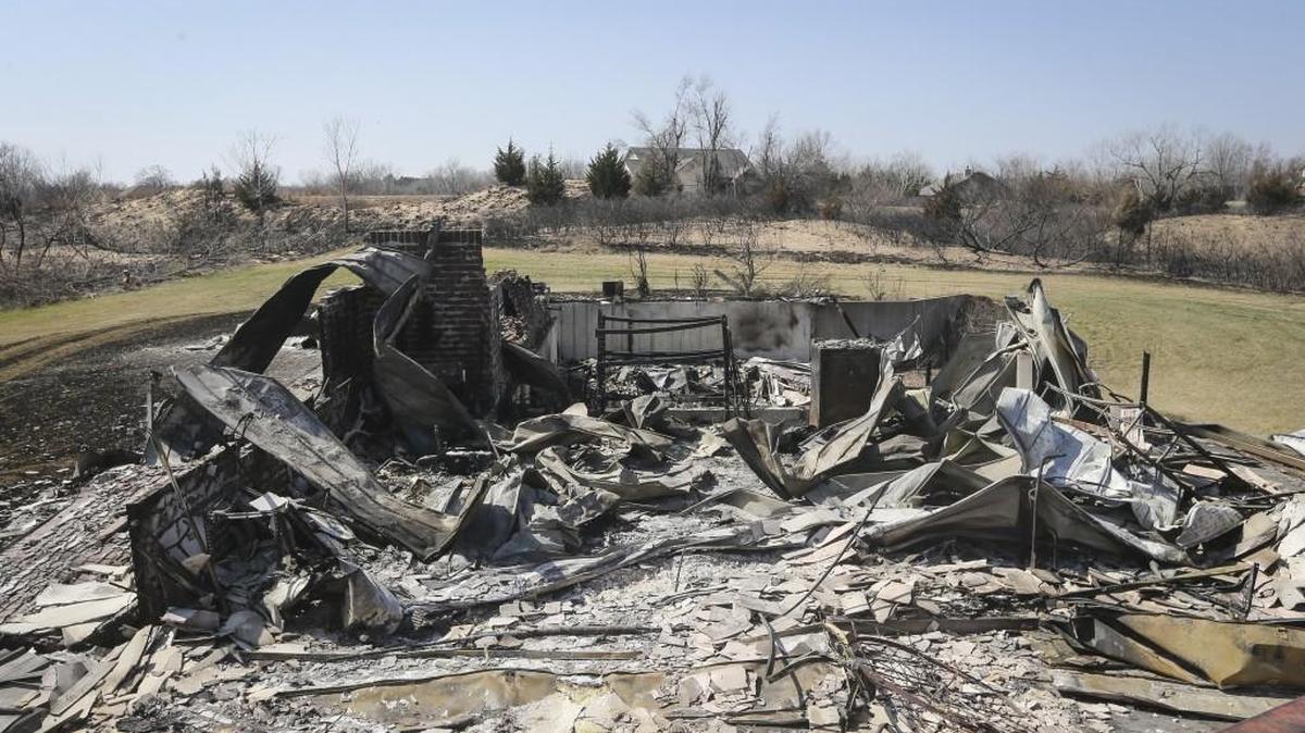 A home in the Highlands subdivision north of Hutchinson lies in ruins, a few days after a wildfire tore through the area. At least nine homes were destroyed in the blaze. (March 9, 2017)