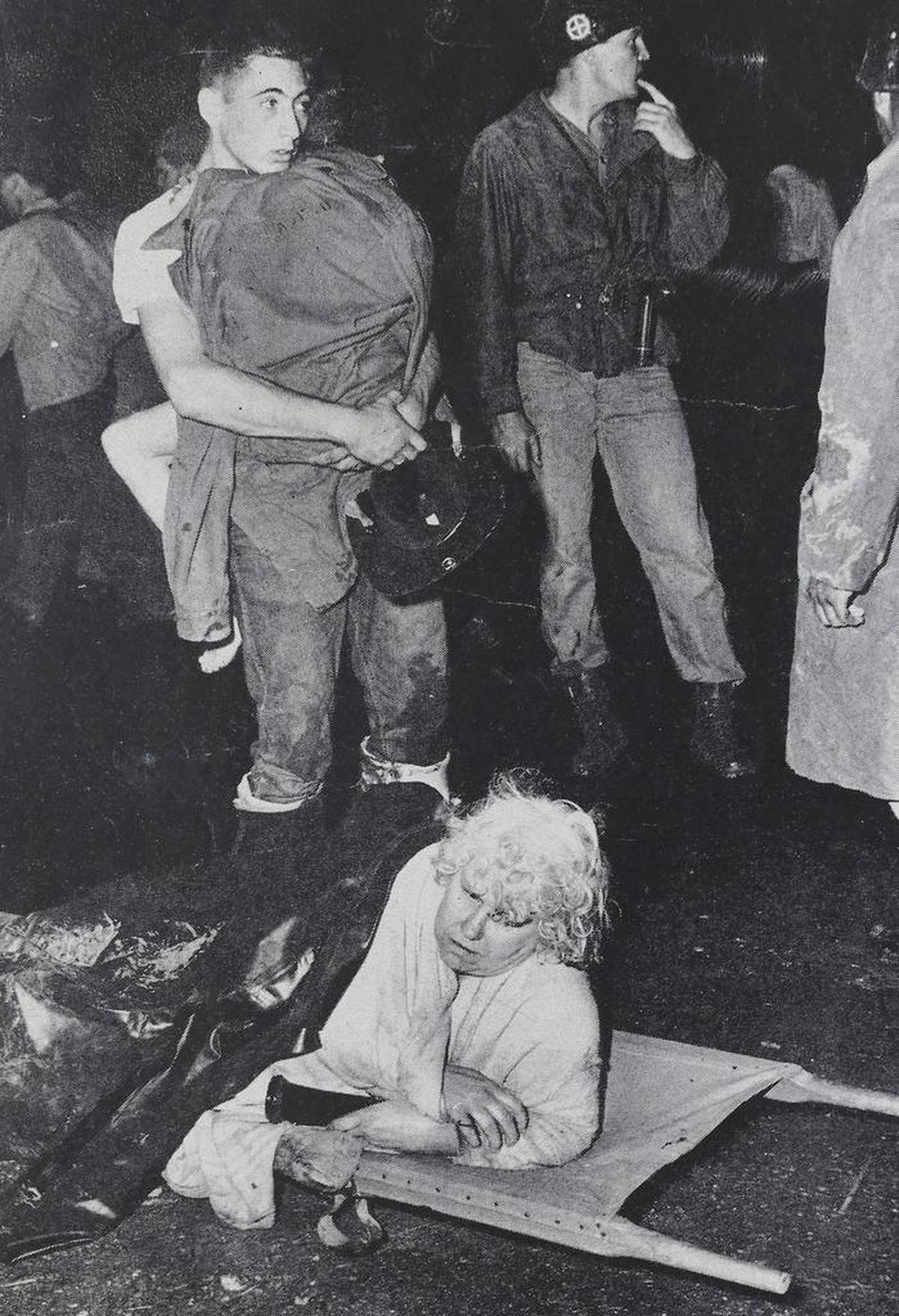 Charlie Rollins was a 25-year-old photographer for The Wichita Eagle in 1955 when a tornado killed 77 people on the night of May 25. Rollins took award-winning photos of the rescue efforts in Udall about an hour after the town was destroyed by the F5 tornado.