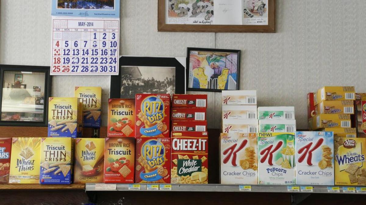 The Cuba store has narrow aisles, a wooden floor, and shows its wear but the locals and visitors love it.