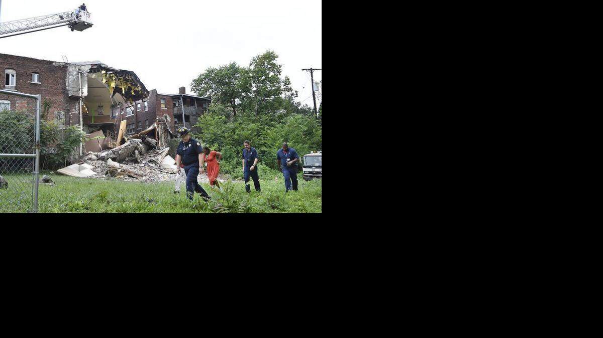 
Emergency personnel were on the scene after part of a three-story brick building housing a church collapsed about 10:45 a.m. near Independence Avenue and Benton Boulevard in Kansas City last month. More than 60 people, many of them children attending a three-day bible camp at Rio de Agua Vida, escaped the building uninjured. The building is located in the northeast area of Kansas City. (Aug. 7, 2014)
