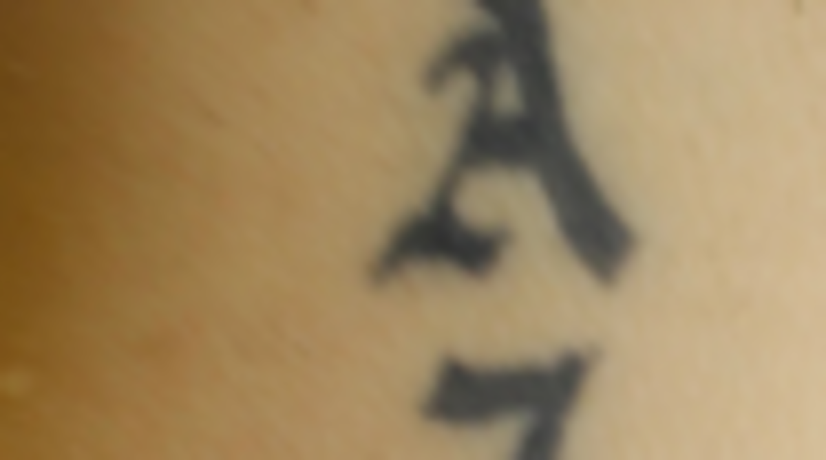 This is one of several tattoos on the body of a woman found dead in a southeast Kansas lake Thursday.