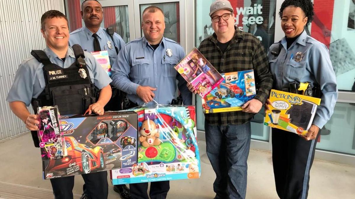 Eric Stonestreet and Mattel donated thousands of dollars worth of toys to Kansas City Kansas Police Department.