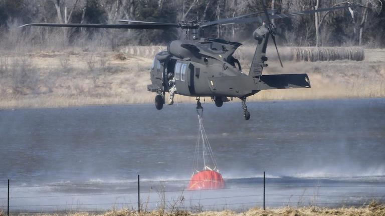 PHOTOS: Crews fight wildfires sweeping across Kansas