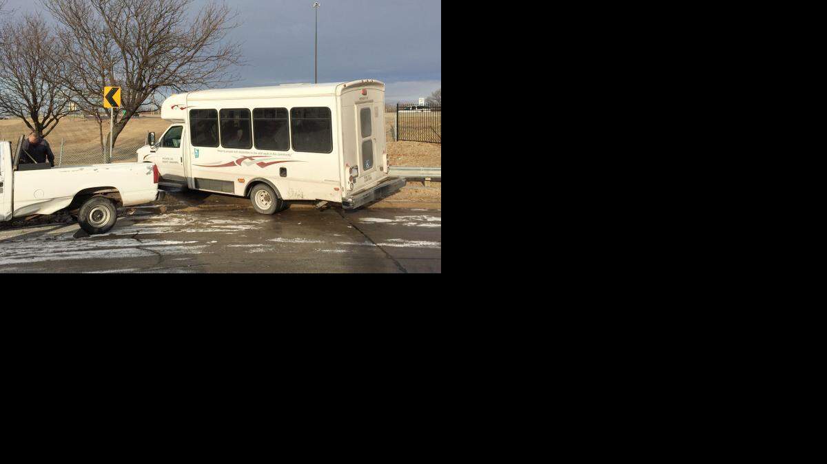 
A KETCH shuttle bus carrying passengers slid into a fence while trying to avoid a parked truck at the bottom of the hill near Calvary Cemetery. Another car hit the shuttle but everyone was OK. (Jan. 14, 2015)
