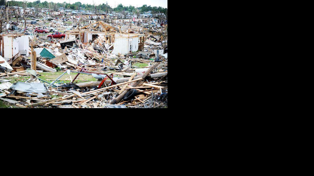 A view of the tornado’s path near Joplin High School in Joplin, Mo. The tornado hit Joplin on May 22, 2011, and killed more than 160 people and injured more than 1,000 others. (May 27, 2011)

