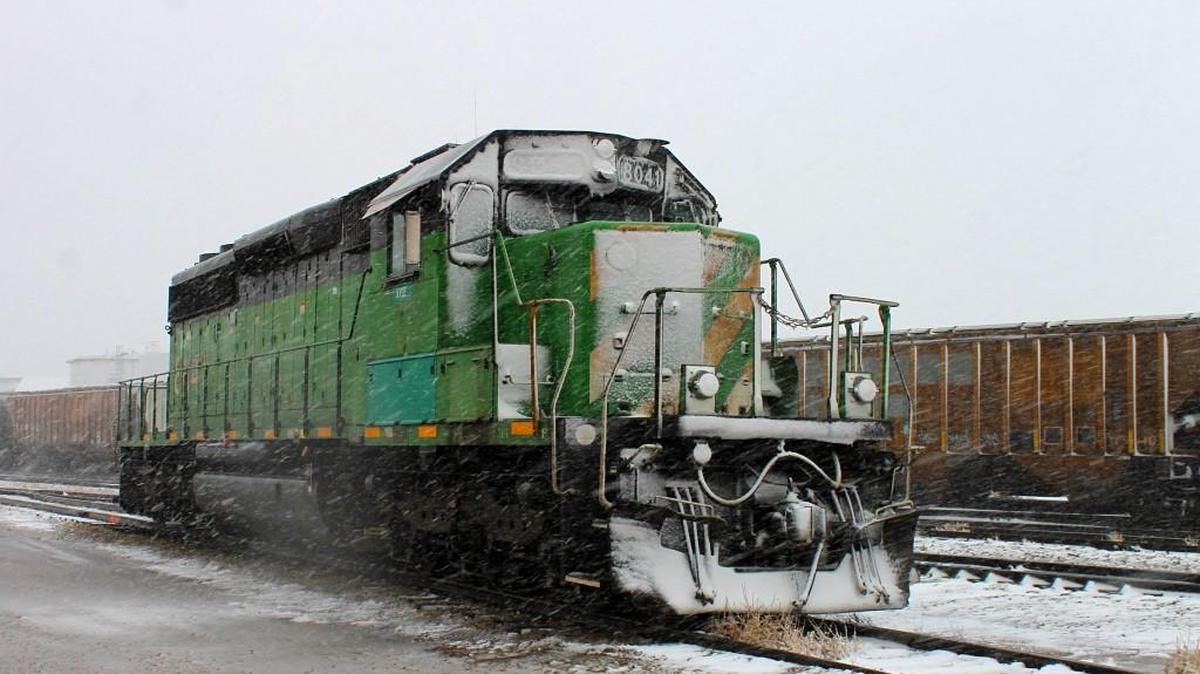 A Kyle Railroad train idles during a snowstorm in Goodland early Wednesday. Dalton Boggs, a Goodland resident, said just enough snow fell to cover the ground.