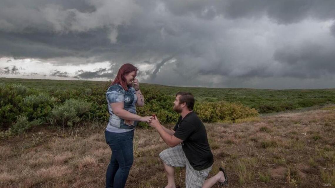 With tornado in the background, he asks her a rather important question