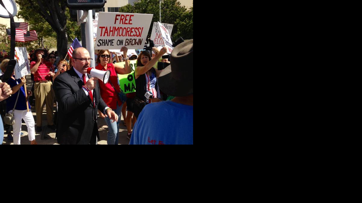 
California Republican Assemblyman Tim Donnelly leads a rally Tuesday in Sacramento, Calif., protesting the jailing of a U.S. Marine in Mexico. 
