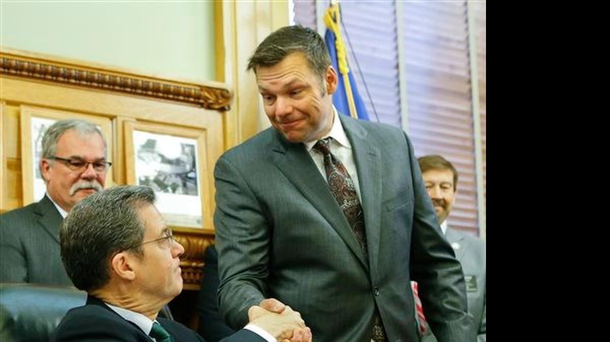 
Secretary of State Kris Kobach, right, is a zealot on the nonissue of voter fraud.
