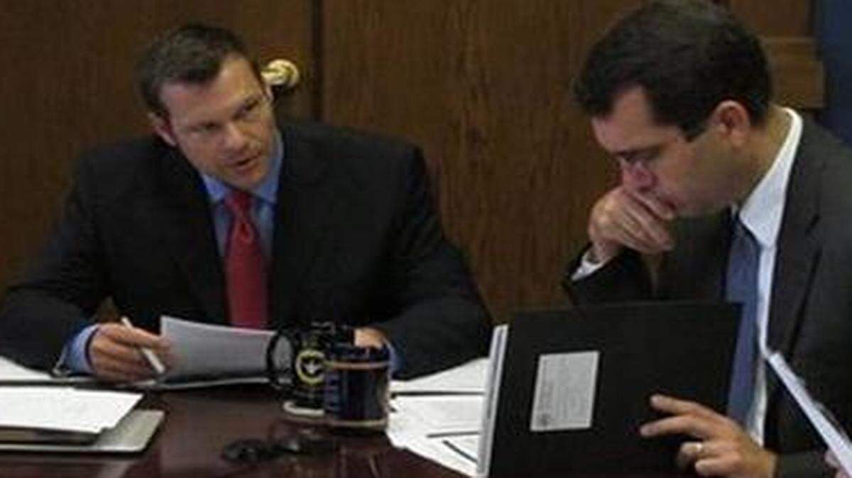 
Secretary of State Kris Kobach and Attorney General Derek Schmidt discuss whether to allow a 92-year-old women to vote.

