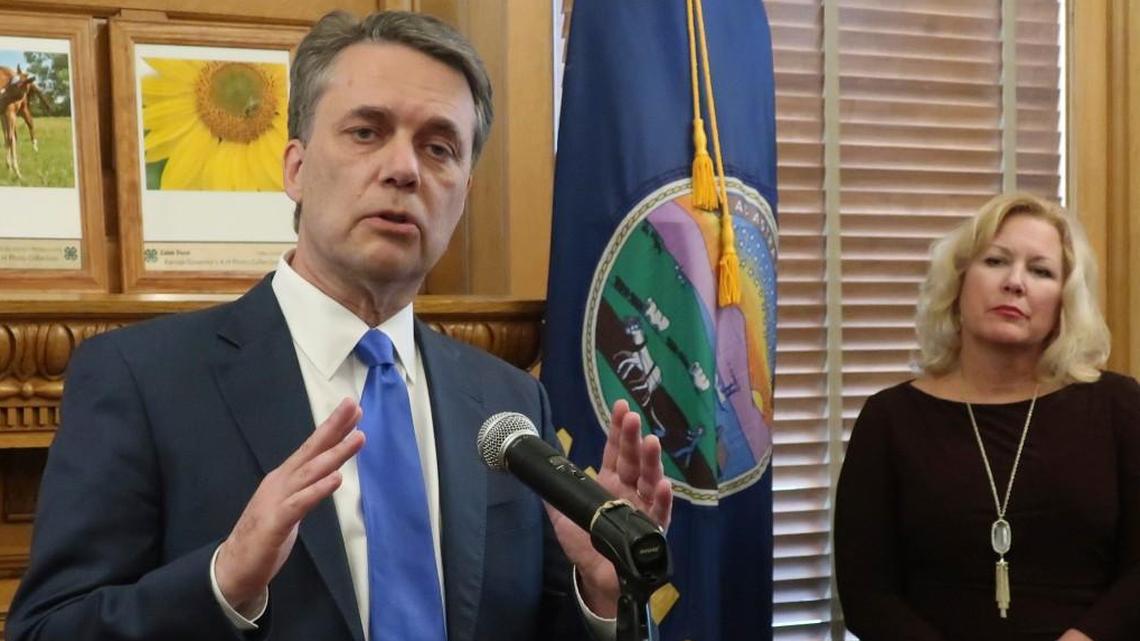 Kansas Gov. Jeff Colyer answers questions from reporters about a new government transparency law on Thursday in Topeka.