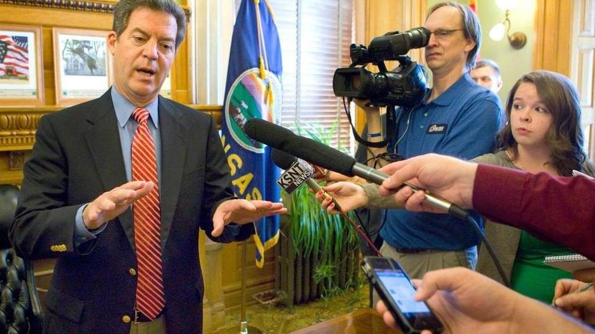 What would be a fair, objective way to gauge the results of the state’s tax policies? How about the benchmarks that Gov. Sam Brownback himself established?