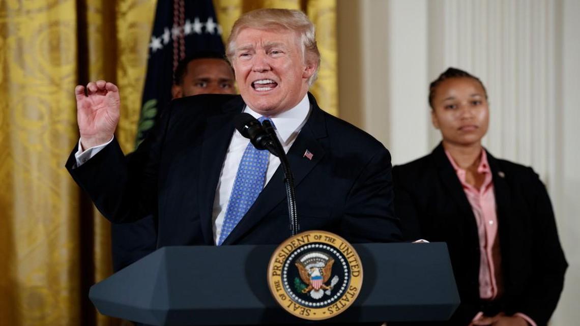 President Donald Trump speaks in the East Room of the White House in Washington on Thursday during a ceremony to recognize the first responders from the June 14 Congressional baseball shooting.