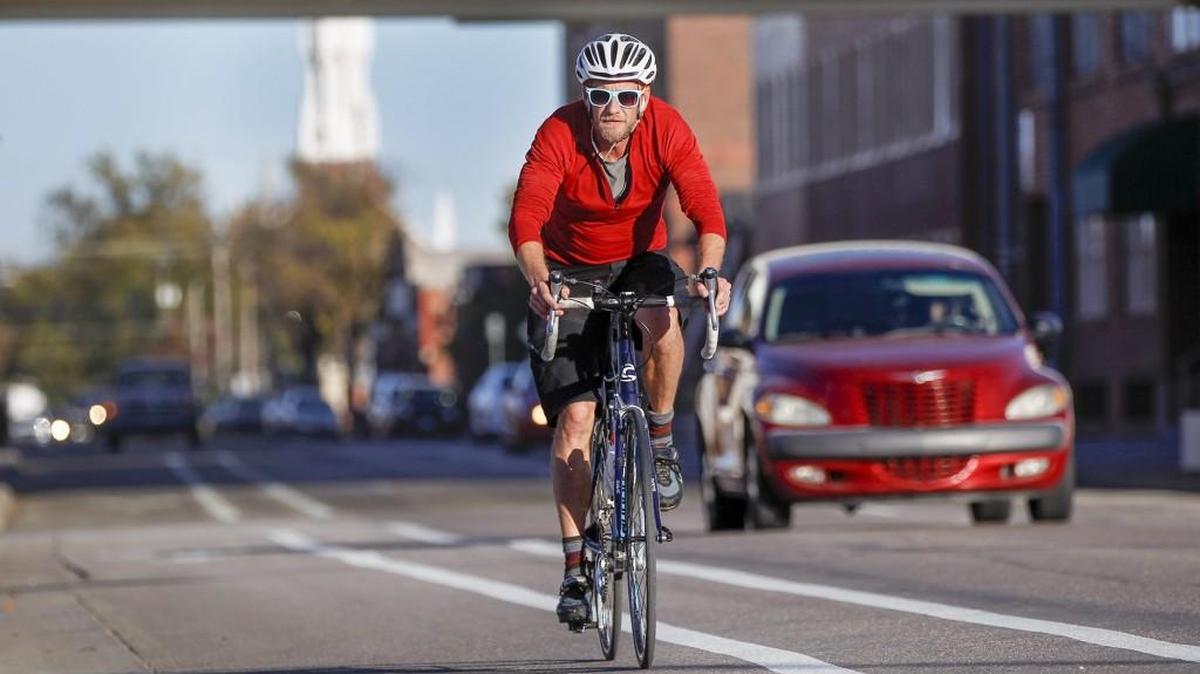 Peter Hiesterman makes his way down one of the bike lanes on 2nd St. in downtown Wichita in 2015.
