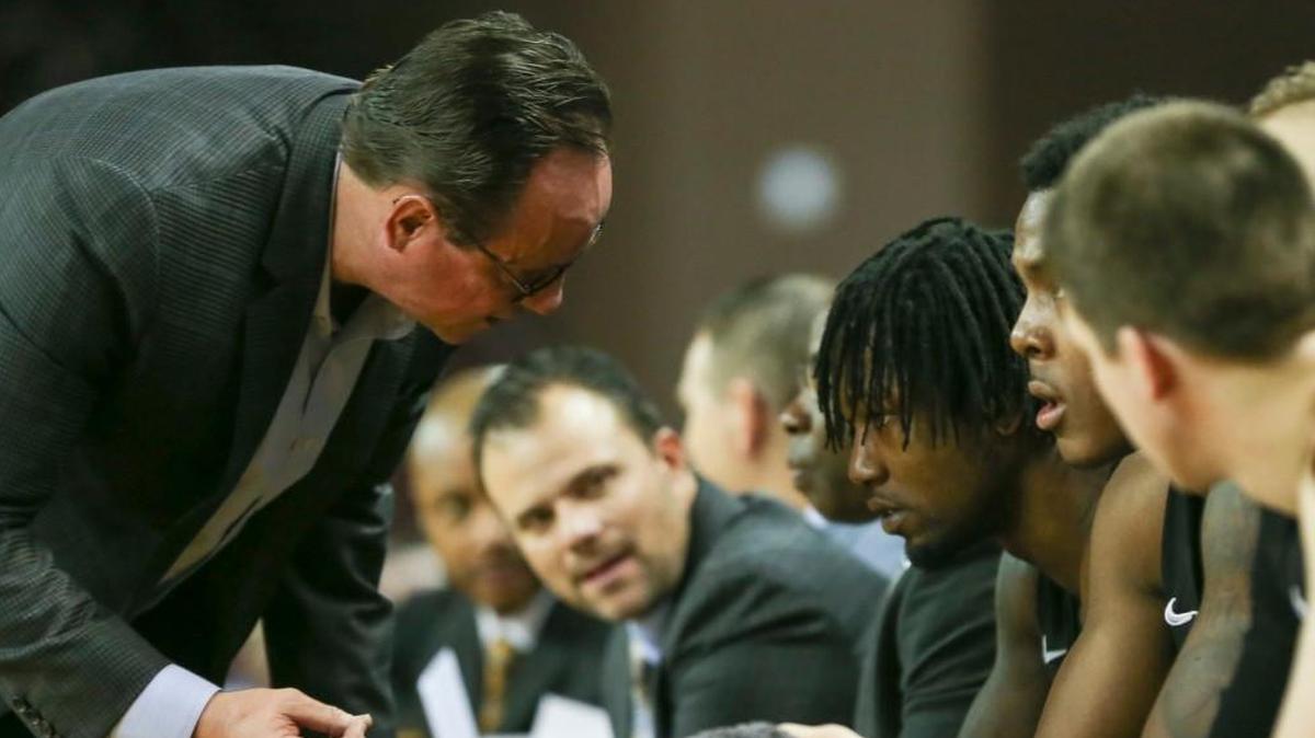 Wichita State coach Gregg Marshall talks to Zach Brown on the bench during the second half of their game in Houston on Saturday.