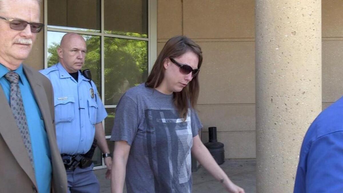 Emily Glass walks out of the Sedgwick County Jail on May 30, a couple of hours after District Attorney Marc Bennett announced that there are currently no charges being filed in the case of Lucas Hernandez.  She was found dead June 8.