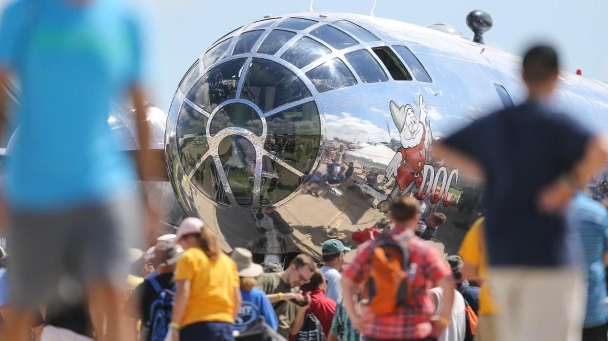 Crowds surround the restored B-29 “Doc” as it sits on display at the EAA AirVenture show in Oshkosh, Wis.