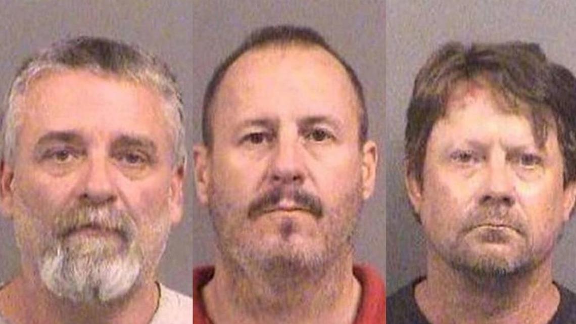 This combination of Oct. 14, 2016, file booking photos provided by the Sedgwick County Sheriff's Office show, from left, Patrick Stein, Curtis Allen and Gavin Wright, three members of a Kansas militia group who were convicted of plotting to bomb an apartment building filled with Somali immigrants in Garden City.
