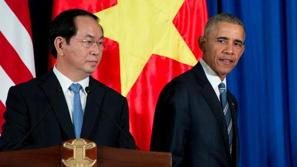 Vietnamese President Tran Dai Quang and President Obama conclude a press conference Monday in Hanoi, Vietnam.