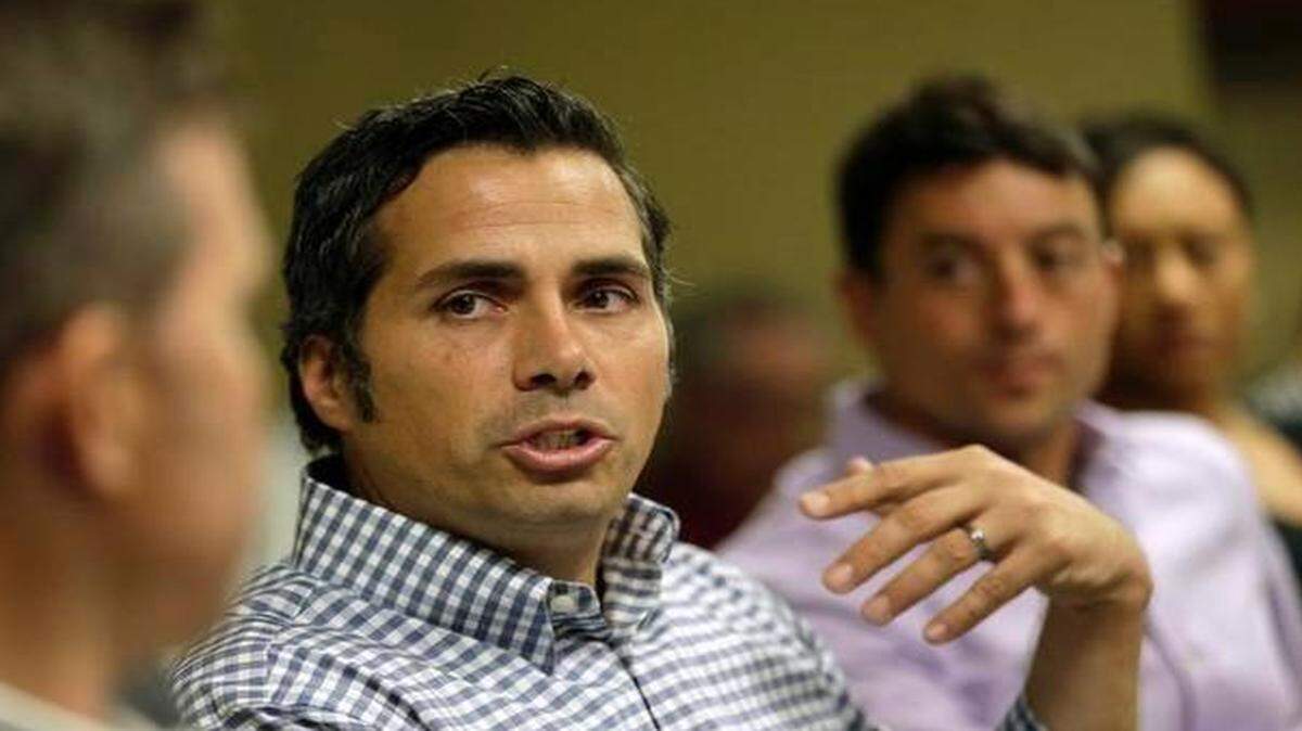 
Independent U.S. Senate candidate Greg Orman talks to workers at a health care company Sept. 10 in Overland Park. 
