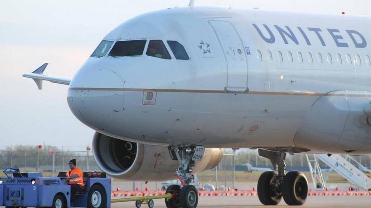 Crews tow a United Airlines Airbus A319 to the passenger gates at Wichita Eisenhower National Airport in 2016. United and its regional carriers have seen a decline in the number of passengers flying out of Wichita, and it’s not clear whether its high fares to Denver and cheaper flights from Salina are part of the cause.