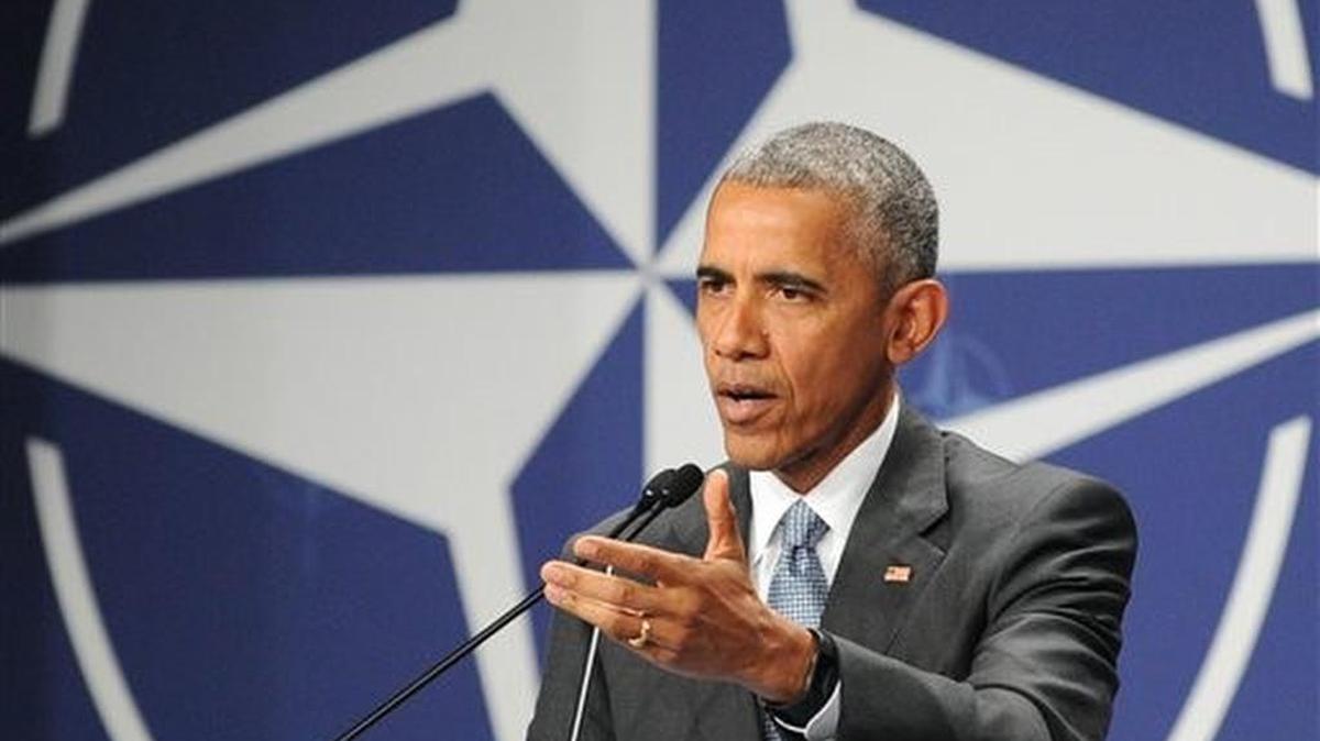 President Obama speaks at a press conference at the NATO summit in Warsaw, Poland.