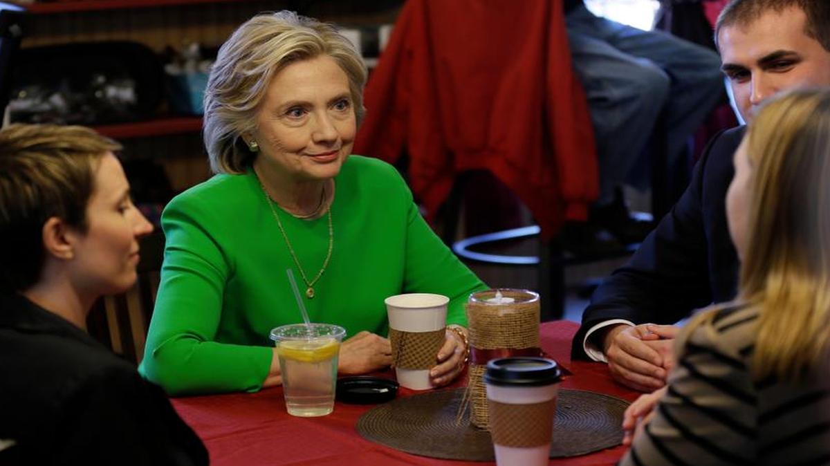 
Democratic presidential candidate Hillary Clinton meets with local residents at the Jones St. Java House in Le Claire, Iowa.
