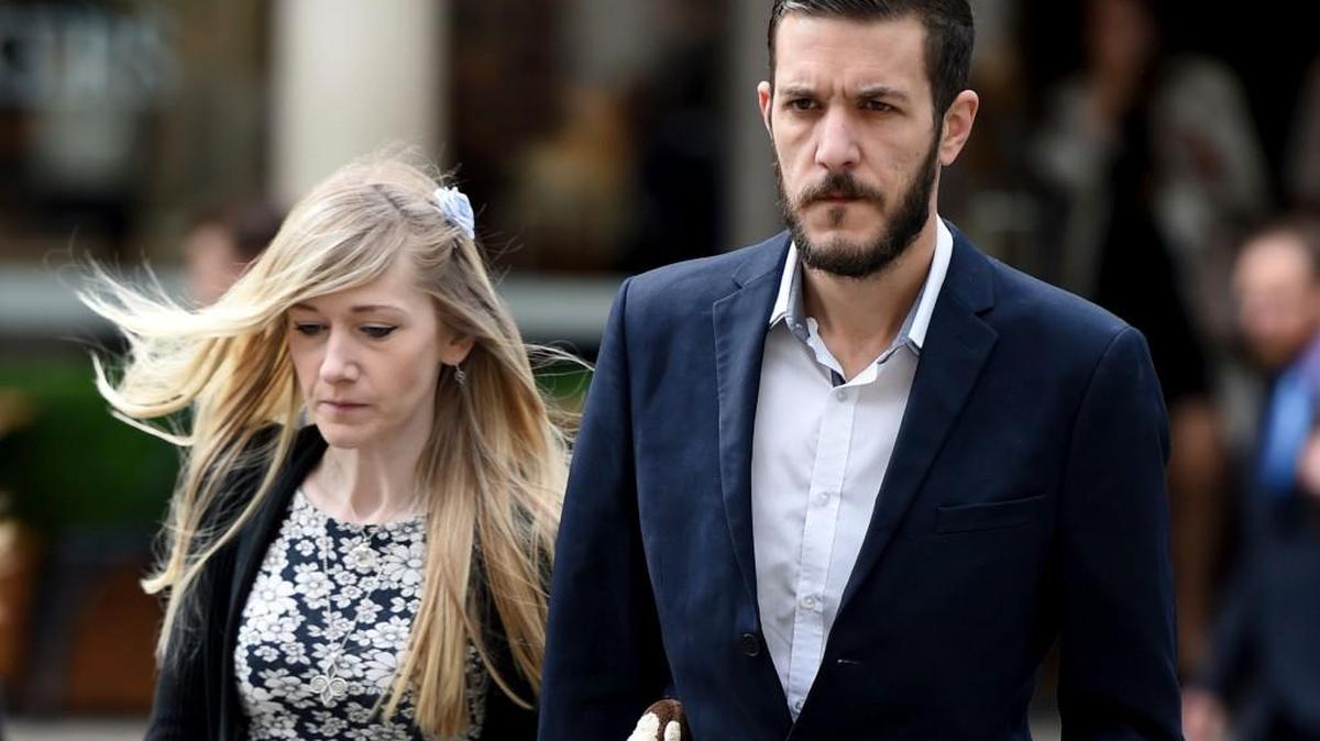 Charlie Gard's parents Connie Yates and Chris Gard arrive at the Royal Courts of Justice in London where the hearing will resume into the case of their terminally-ill baby, Friday July 21, 2017. A British court is giving the parents of 11-month-old Charlie Gard a chance to present fresh evidence that their terminally ill son should receive experimental treatment.