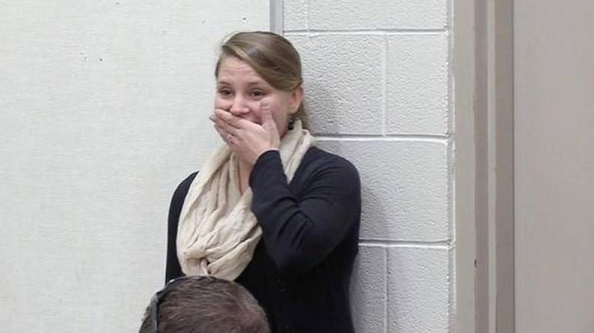 Heidi Albin reacts after being named a Milken Educator Award winner Thursday. The Complete High School Maize science teacher is one of 43 winners nationally.