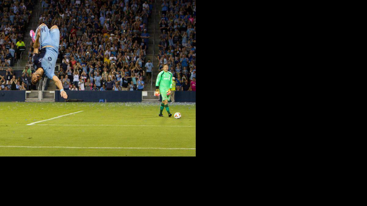 
SKC's Dom Dwyer celebrates his second goal on a penalty kick as Toronto keeper Joe Bendik watches Saturday atr Sporting Park in Kansas City, Kan.
