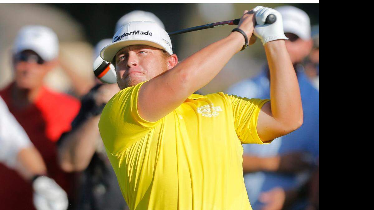 
Ryan Spears, a former Wichita State golfer who turned pro in 2009, watches a shot during the 2013 Air Capital Classic at Crestview Country Club.
