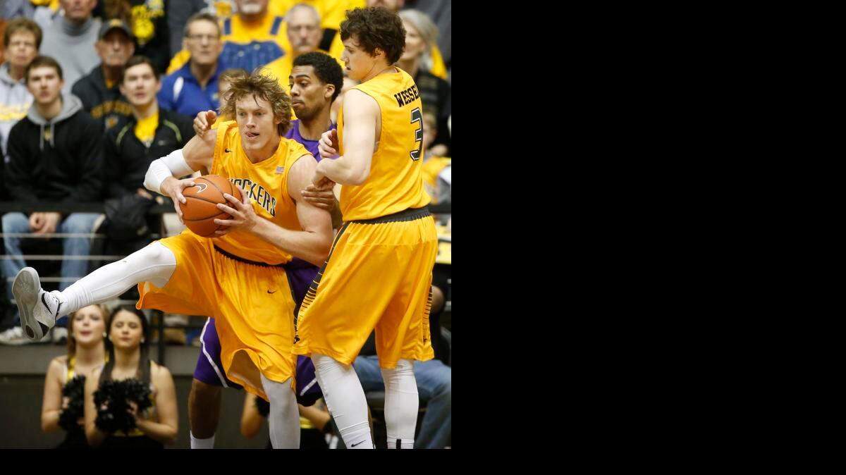 
Wichita State's Ron Baker grabs a rebound against Evansville at Koch Arena. He finished the game with 15 rebounds. (February 22, 2015) 
