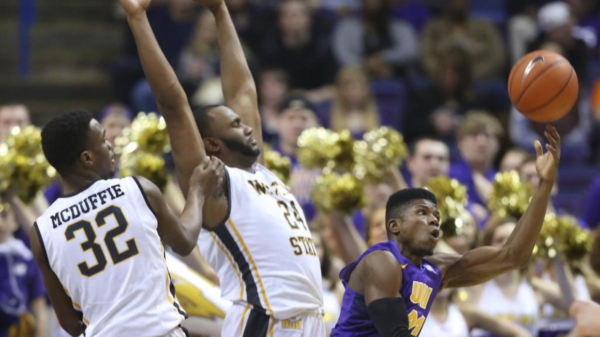Northern Iowa guard Wes Washpun throws up a shot after being fouled by Wichita State forward Shaquille Morris during the second half of their game at the Scottrade Center in St. Louis on Saturday.