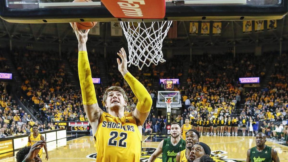 Wichita State center Asbjorn Midtgaard takes a shot against South Florida during the second half of a game at Koch Arena. (Jan. 7, 2018)