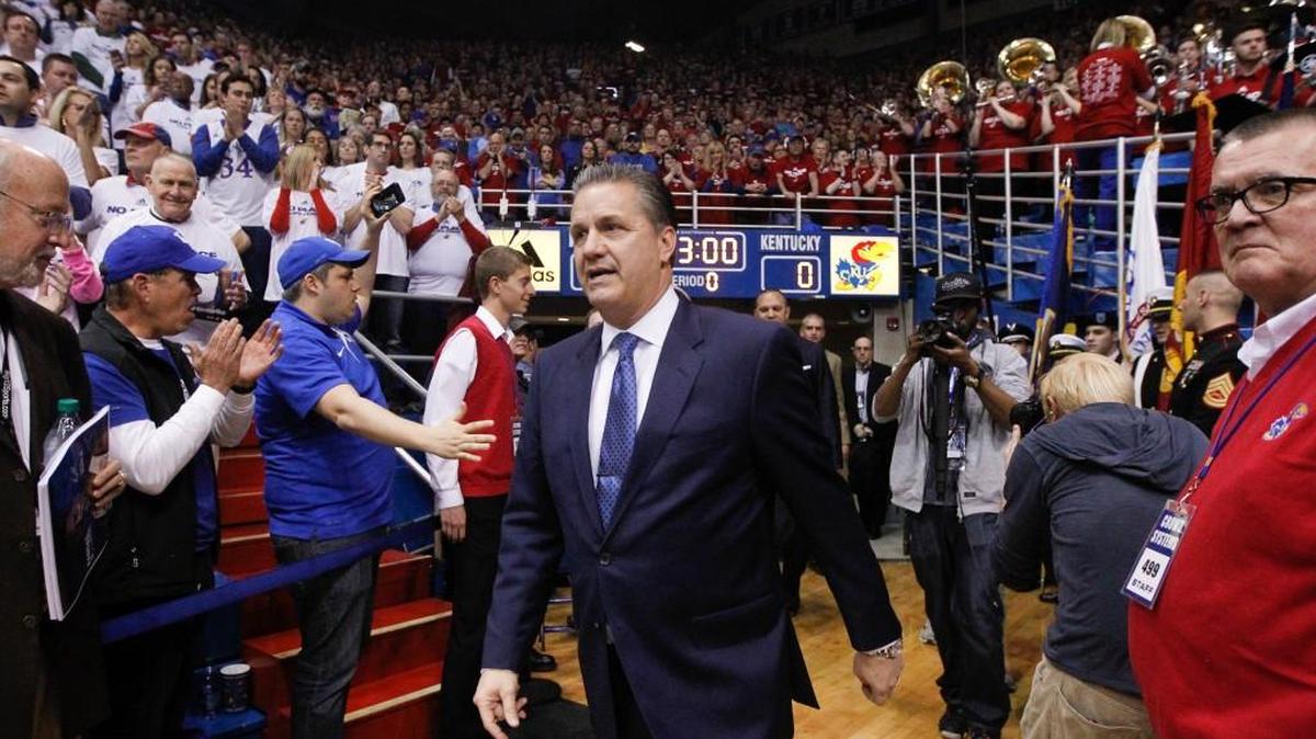 Kentucky coach John Calipari walks onto the court before his team's game against Kansas at Allen Fieldhouse a year ago.