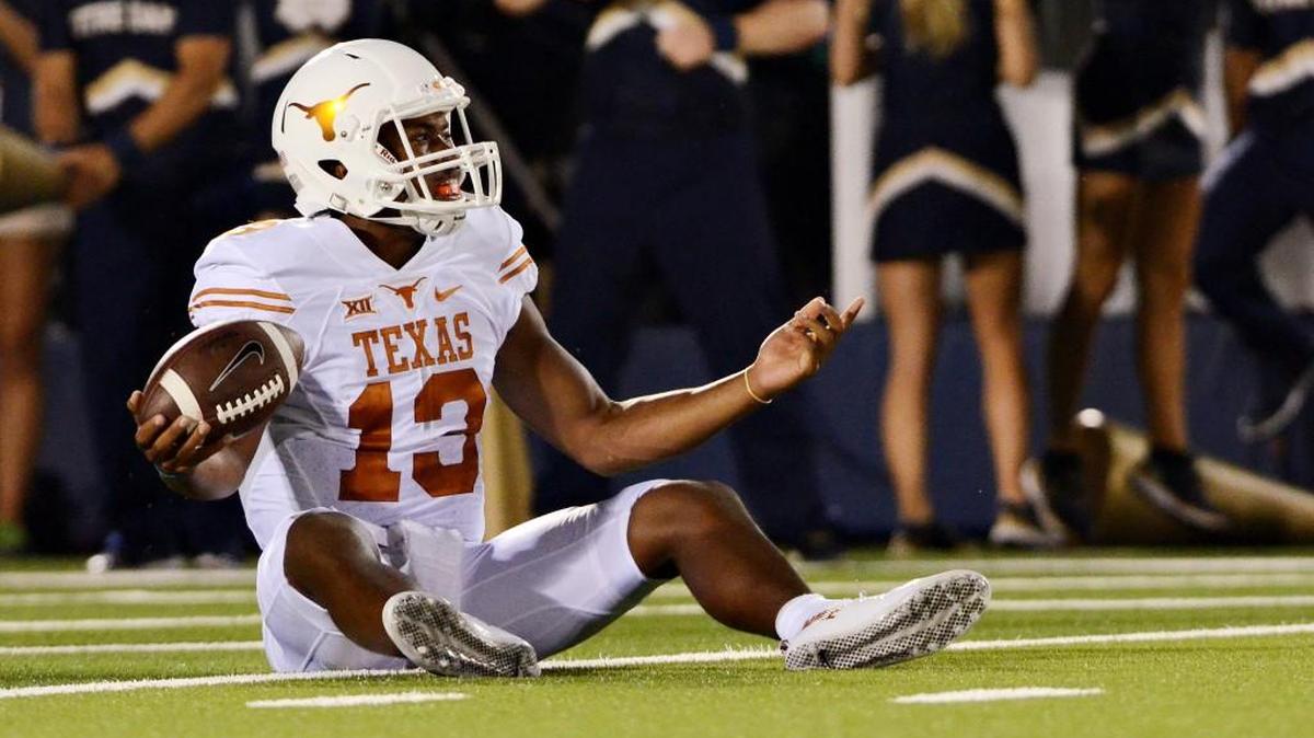 
Texas quarterback Jerrod Heard reacts after being sacked by Notre Dame. (Sept. 5, 2015)
