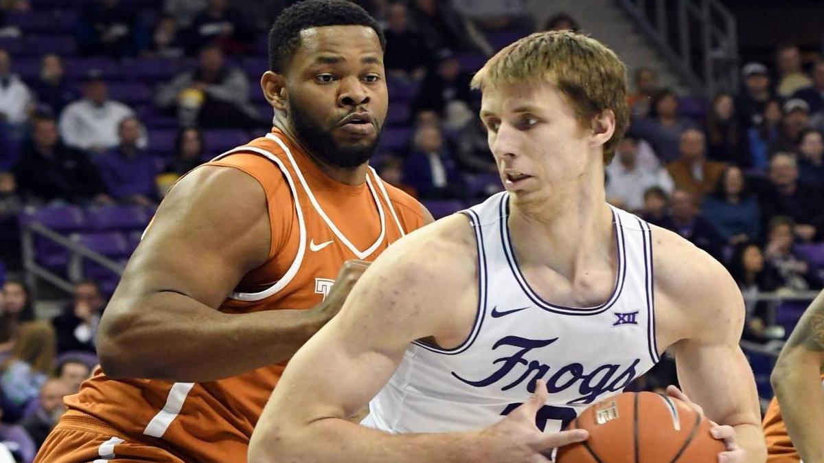 TCU's Vladmir Brodziansky looks to drive to the basket against Texas's Shaquille Cleare in the first half on Saturday, Feb. 4, 2017, at Schollmaier Arena, in Fort Worth, Texas. TCU won 78-63. (Bob Haynes/Fort Worth Star-Telegram/TNS)