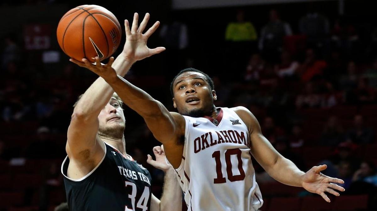 Oklahoma guard Jordan Woodard shoots in front of Texas Tech forward Matthew Temple last week in Norman.