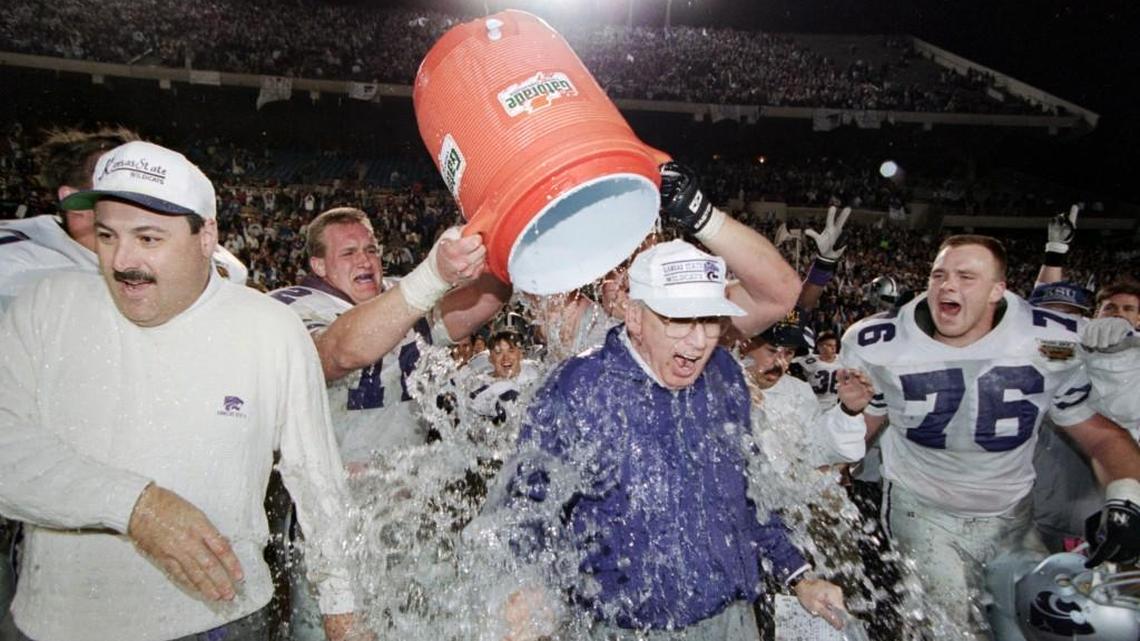 K-State players celebrate after the Copper Bowl by giving Bill Snyder a Gatorade bath.