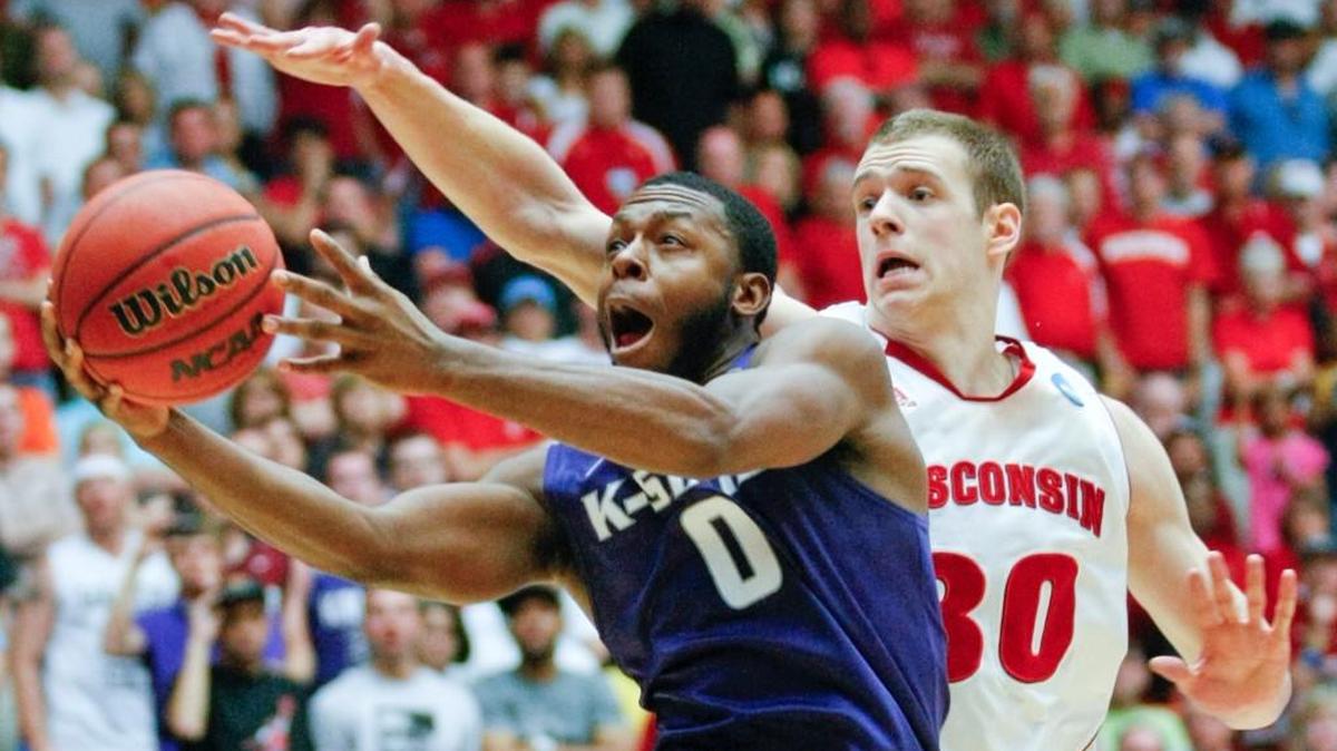 Former Kansas State star Jacob Pullen goes to the basket against Wisconsin in the NCAA Tournament. (March. 17, 2011)