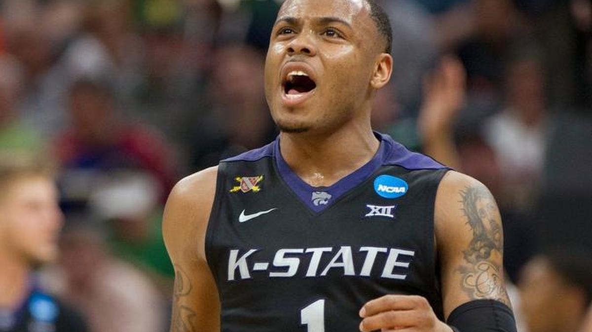 Kansas State guard Carlbe Ervin celebrates after scoring in the first half against Cincinnati on Friday night.