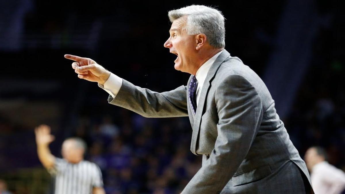 K-State basketball coach Bruce Weber receiving letters of intent from two high school guards on Wednesday.