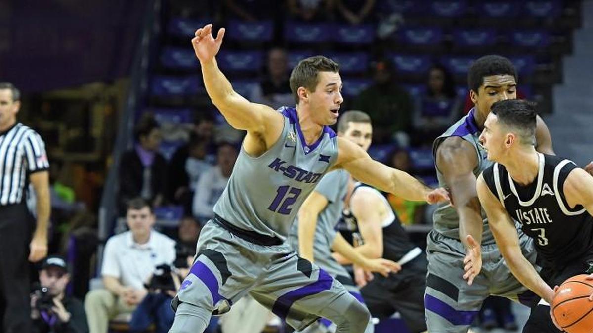 Former K-State guard (left) will be on the K-State bench as a graduate assistant this upcoming season.