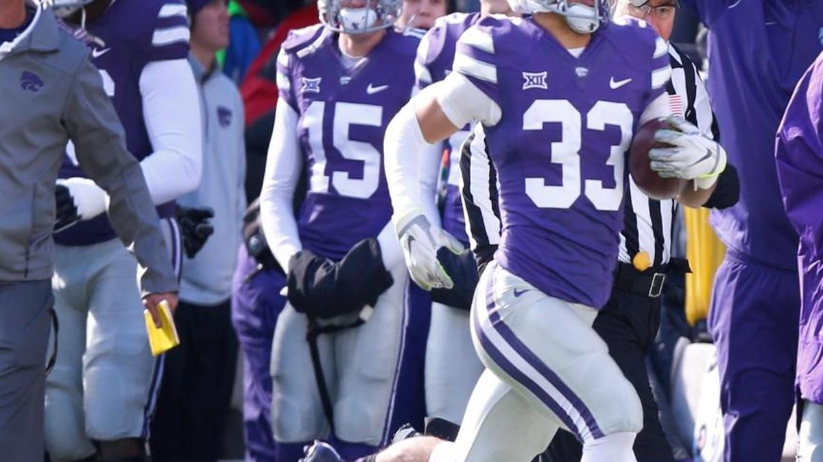 K-State’s Morgan Burns sprints 100 yards on a kickoff return for a touchdown against Iowa State last Saturday.
