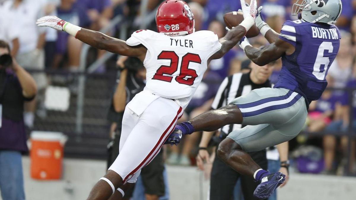 
K-State wide receiver Deante Burton (6) leaps for a Joe Hubener pass for a touchdown in the second quarter against South Dakota on Saturday in Manhattan

