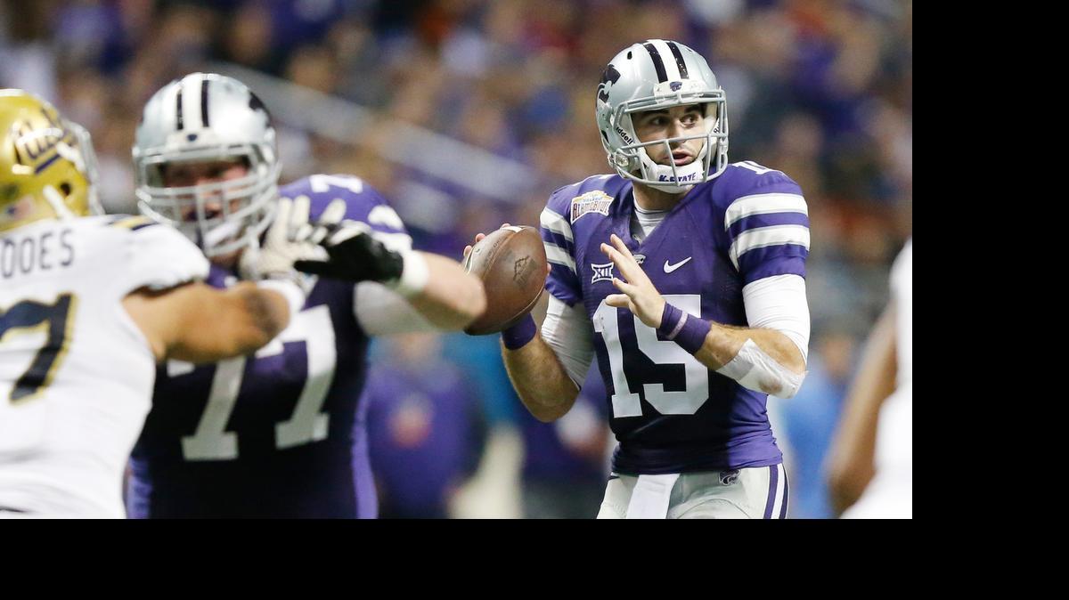 
K-State left guard Boston Stiverson (77) protects quarterback Jake Waters at the Alamo Bowl.
