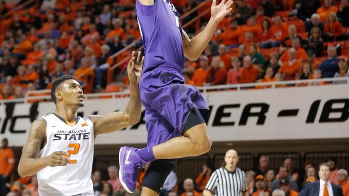 Kansas State guard Justin Edwards goes up for a dunk at Oklahoma State last season, a highlight in an inconsistent season. “It took him time to understand how hard it is and how good this level is,” K-State coach Bruce Weber said. “Confidence level was a factor. You start doubting yourself, and things become that much harder.”