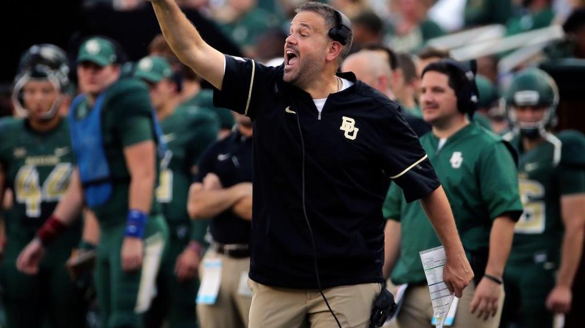 Baylor coach Matt Rhule calls in a play against Liberty in the first half of an NCAA college football game, Saturday, Sept. 2, 2017, in Waco, Texas. (Jerry Larson/Waco Tribune Herald, via AP)