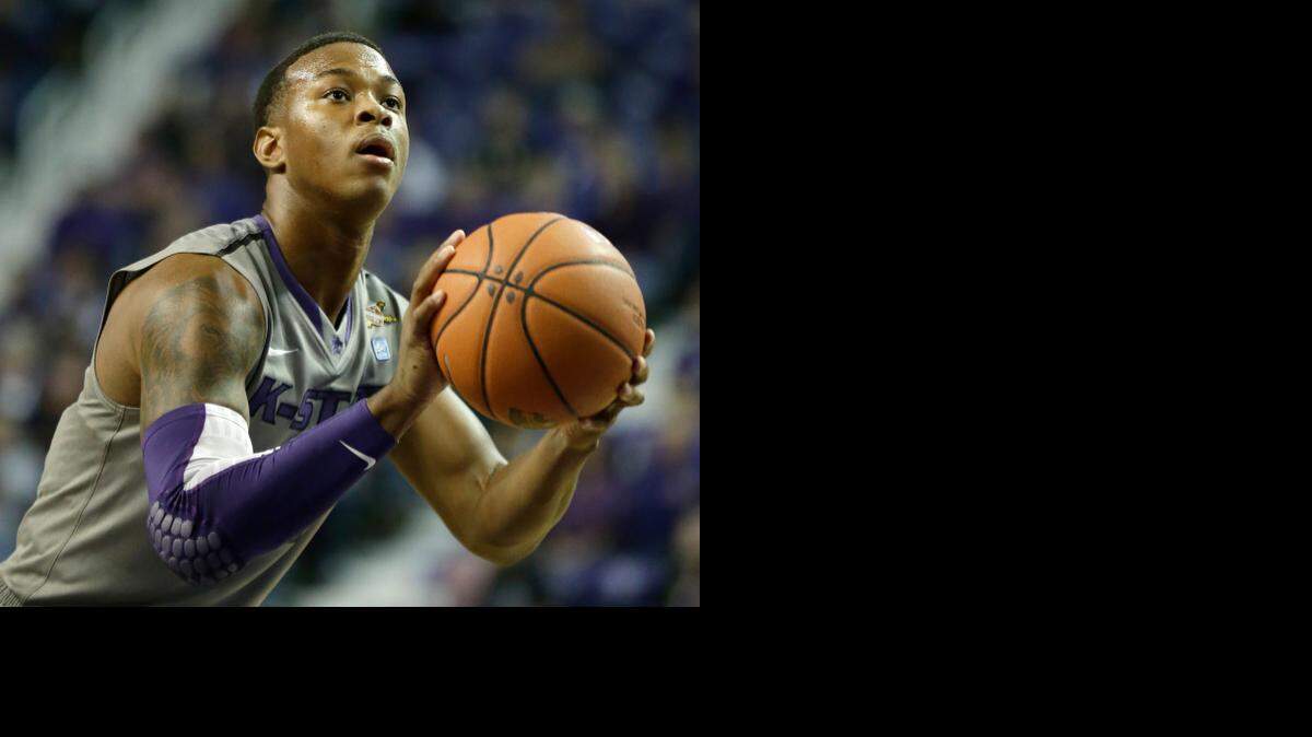 
Kansas State's Marcus Foster shoots a free throw against Long Beach State.

