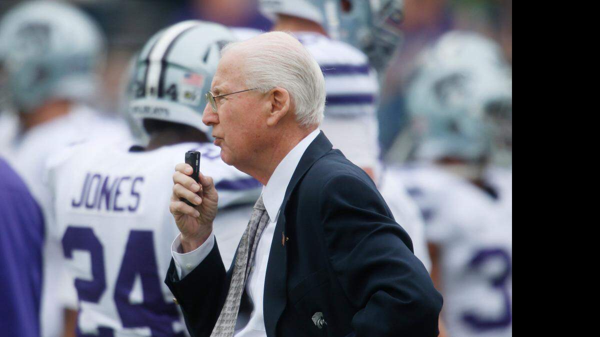
K-State coach Bill Snyder records his notes during the 2013 spring game at Snyder Family Stadium. “I kind of take it as a practice and record what I think, good bad or indifferent,” Snyder said. “Then we address that at halftime, after the game, and next week in our meetings and so on.”
